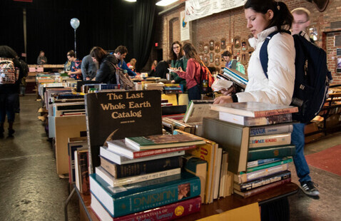 People shopping at a book fair.
