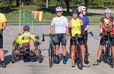 Cyclists line up for a training ride.