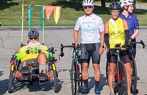 Cyclists line up for a training ride.