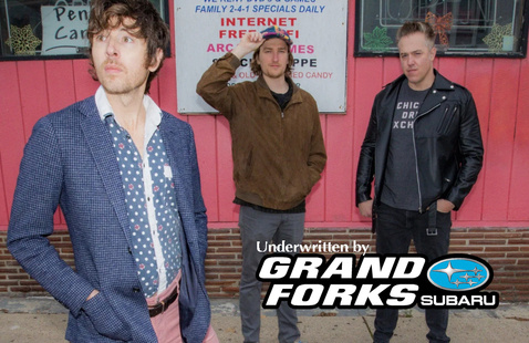 Brett Newski and band with text in foreground: underwritten by Grand Forks Subaru