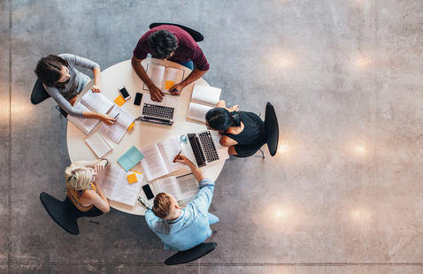 Students collaborating at a table