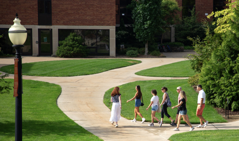 A Hope College tour guide leads a tour around campus.