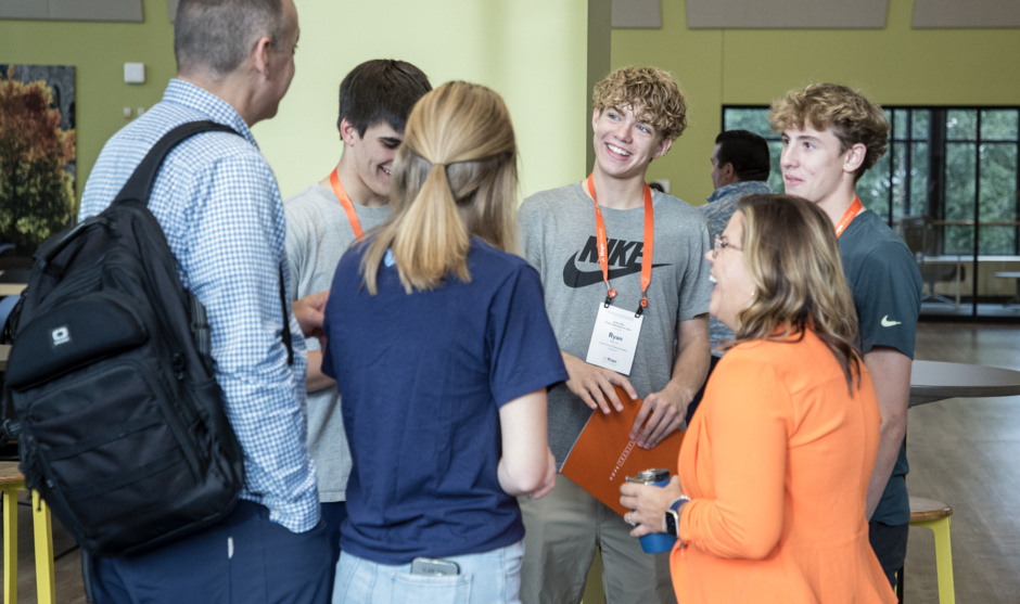 Hope Admissions staff converse with prospective students and their family.