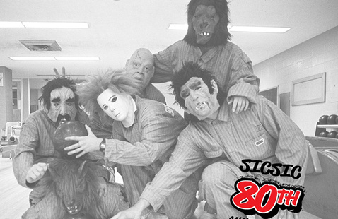 SIC SIC members with an 80th anniversary graphic