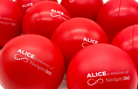 Multiple red stress balls with ALICE a solution of Navigate 360 written on them