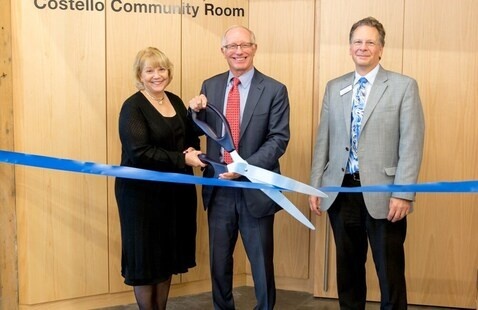 Doorway of Costello Community Room with ribbon cutting