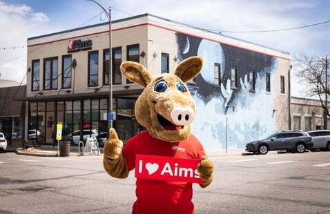 Arty the Aardvark in front of the Loveland Campus