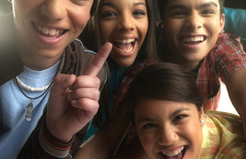 A group of smiling teens 