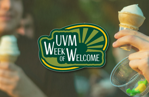 Close up of two cremes being held in the sunset , with the UVM week of welcome logo appearing in front of them. 