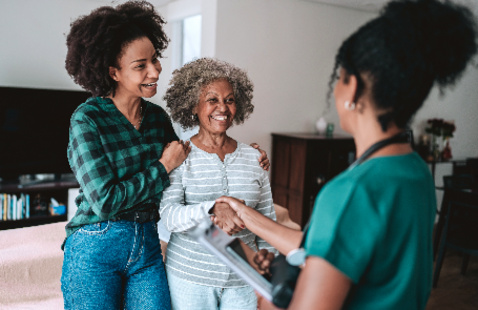 Mother, Daughter, and medical professional talking