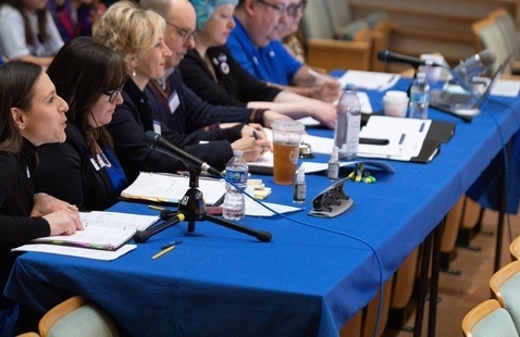 Panel of judges at table