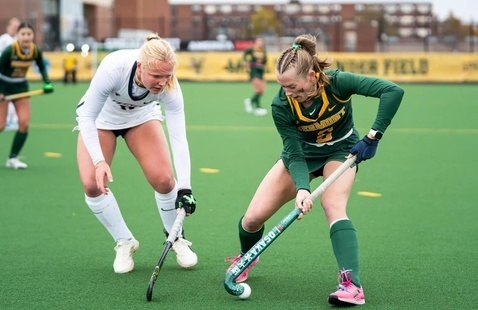 Players battle for the ball.