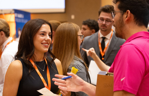 Student at Career EXPO Week talking with Recruiter
