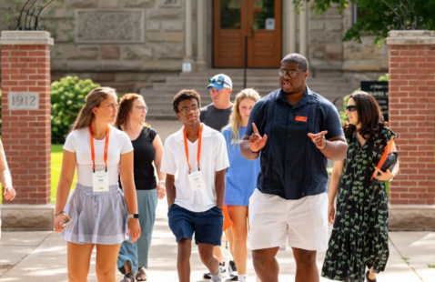 A Hope College tour guide leads a tour around campus.