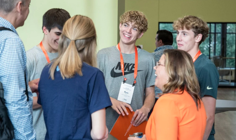 Hope Admissions staff converse with prospective students and their family.