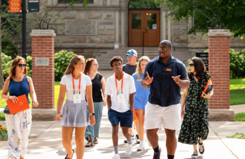 A Hope College tour guide leads a tour around campus.