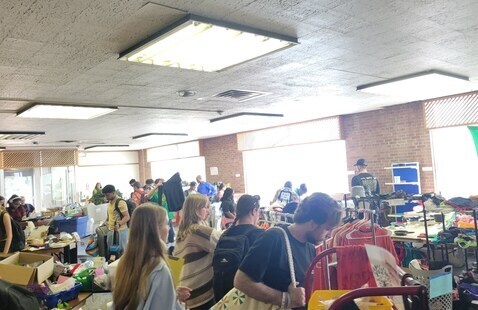 Shoppers browsing items in the Campus ReStore