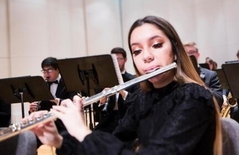 Students performing in musical ensemble