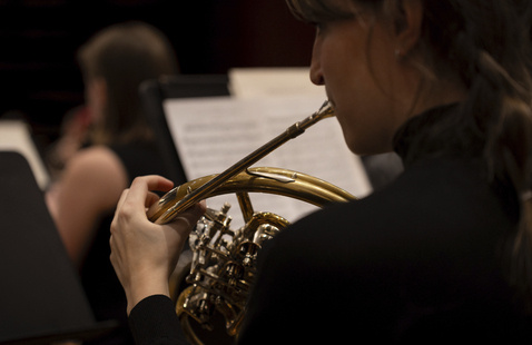 Students performing in musical ensemble
