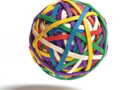 multi-colored rubber bands form a ball to represent the idea of bouncing back and resilience