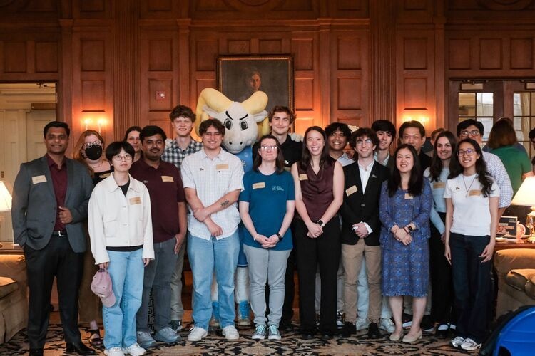 Members of the Data-Driven EnviroLab pose with Rameses, the UNC-Chapel Hill mascot.