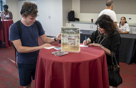 Family Members and Supporters writing postcards