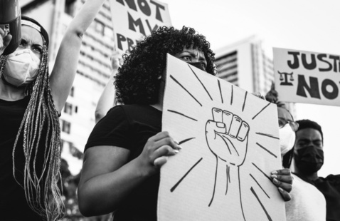 Demonstrators from different cultures and race protest on street for equal rights