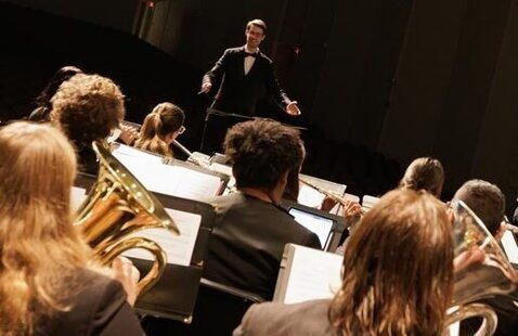 Wind Ensemble and Wind Symphony performing in concert