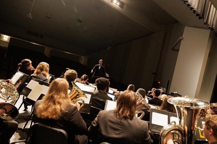 Wind Ensemble and Wind Symphony performing in concert