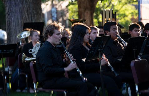 Students performing in musical ensemble