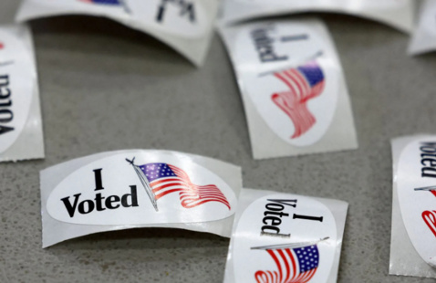 Stickers that all say "I voted" and have a picture of the American flag on them. 