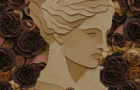 A statuesque figure of a woman's head in a field of dead roses. 