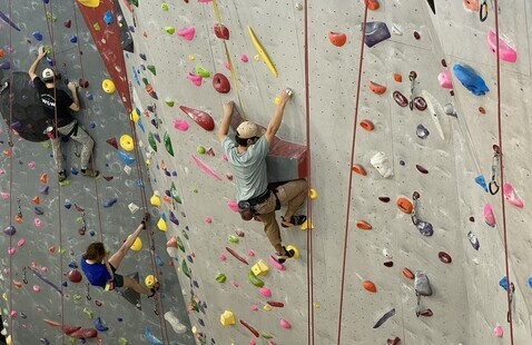Students climbing at the Climbing Center.
