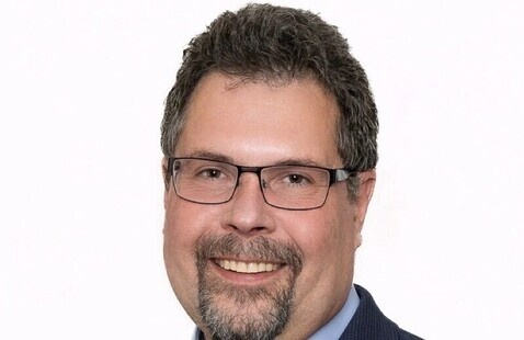 Dr. John Kitching