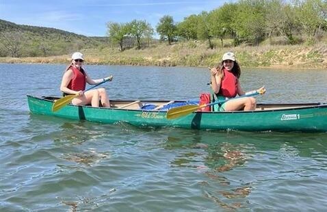 Two women in a kayak.