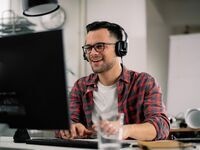 An individual taking part in webinar