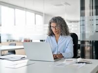 An individual taking part in webinar