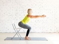 An individual practicing mindful breathing and stretching