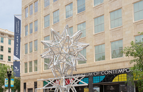 Star sculpture outside building