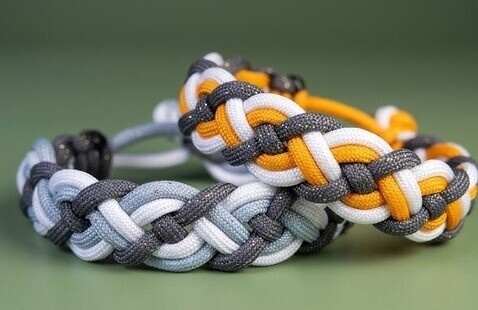 Two colorful paracord bracelets.
