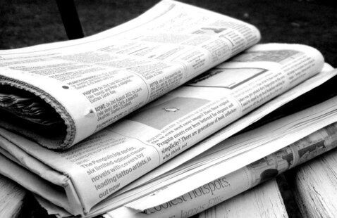A stack of newspapers.