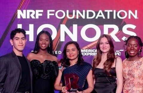 A group photo of the UNT NRF. Behind them are the words "NRF FOUNDATION HONORS".