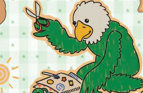 Scrappy scrapbooking as he holds scissors in the air.