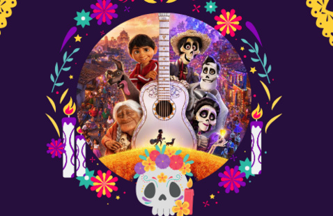 The poster for Coco surrounded by Day of the Dead imagery.
