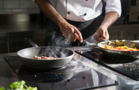 A chef cooking.