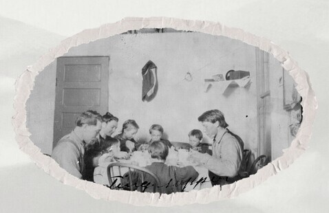 Black and white photo of family at table with text below: In search of a better life: Norwegian women immigrants in North Dakota"