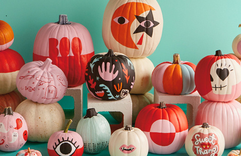 Pile of stacked, painted pumpkins