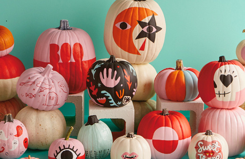 Pile of stacked, painted pumpkins