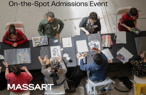 On-the-Spot Admissions Event; MASSART - overhead view of applicants and reviewers at table examining art portfolios.