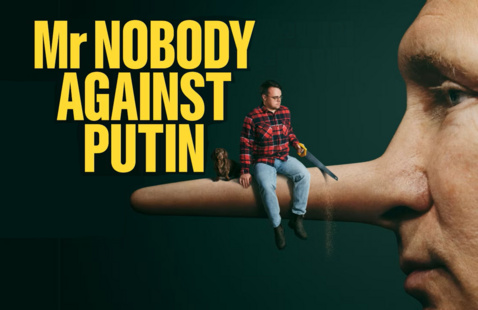 Pavel Talankin sawing off the elongated nose of Vladimir Putin